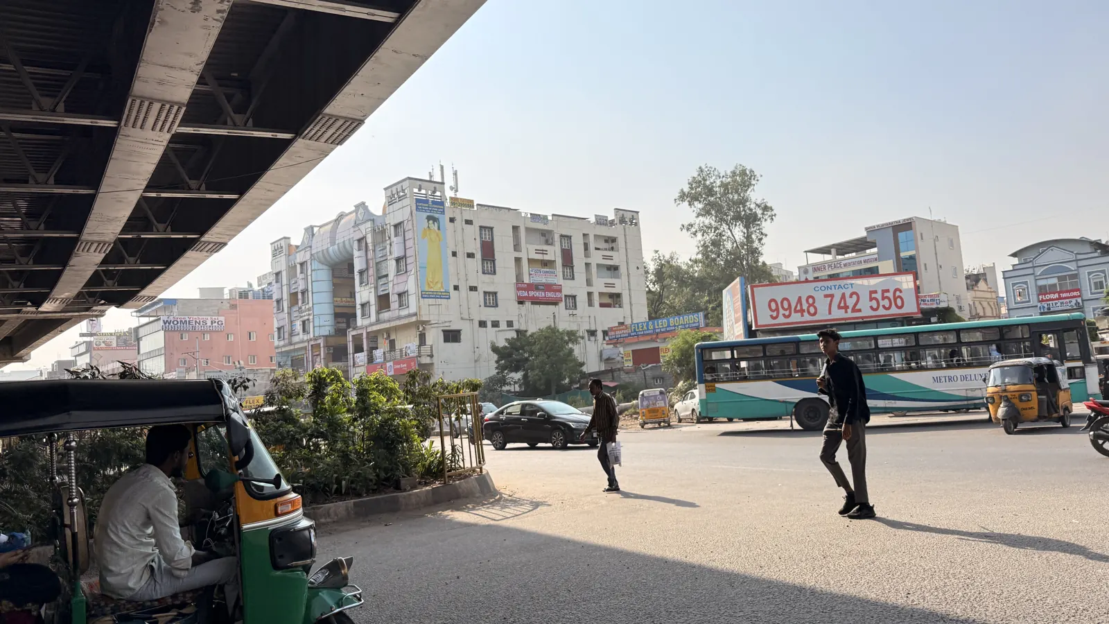 Lingampally Bus Stop junction under the flyover with Hemadurga Sharada Galaxy in view